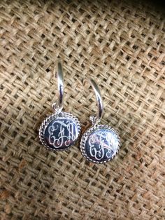 Beautiful Monogrammed Pure Sterling Silver (not plated) Hoop Earrings with 16 mm engravable round drop with rope accents. 🔴IMPORTANT INSTRUCTIONS🔴 Initials should be given in order as they will be monogrammed in the order given: FIRST NAME LAST NAME MIDDLE OR MAIDEN NAME 🚩Please type them in the notes to seller area or message me if ordering from smithwrightco sterling.com. Sterling Silver Monogrammed Hoop Earrings- A great gift that will last a lifetime- These classic, pure sterling silver e Personalized Silver Dangle Hoop Earrings, Personalized Small Hoop Silver Jewelry, Personalized Silver Hoop Jewelry, Silver Hoop Jewelry For Personalized Gift, Silver Hoop Earrings For Personalized Gift, Personalized Round Silver Earrings, Personalized Sterling Silver Hoop Earrings, Silver Monogram, First Name