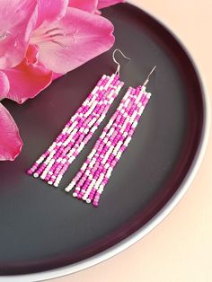 Pink snake beaded earrings are made of high-quality Czech beads on thread. Beaded fringe earrings are hypoallergenic, there are metal accessories. Animal print earrings can be casual, office, or evening wear and it would look great for any occasion. All my items are made with love, I use the best material I could find. * EARRINGS SIZE WITH HOOK: Length - 9 centimeters (3.5 Inches) Width - 1.3 centimeters (0.5 Inches) *NOTE: Colors may look a little different depending on your monitor settings. * White Fringe Earrings, Leslie Brown, Earrings Snake, Hot Pink Earrings, Animal Print Earrings, Beaded Fringe Earrings, Pink Snake, White Fringe, Snake Earrings