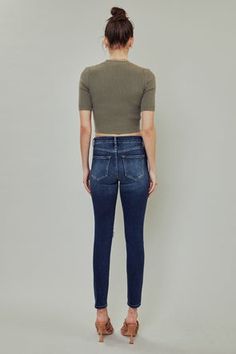 Faded light, medium, and dark-washed denim with distress, whiskering, and knee-destruction for a lived-in look. Our Serena High Rise Jeans sit above the natural waistline as they taper down the leg for a fitted, ankle-skinny silhouette. Made with stretch denim that holds its shape but stretches enough to hold and hug y Ripped Cropped Jeans For Fall, Fitted Cutoff Faded Jeans, Fitted Faded Cutoff Jeans, Distressed Fitted Jeans With Cropped Leg, Washed Denim, High Rise Jeans, Denim Wash, Stretch Denim, Levi Jeans