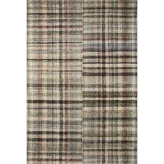 an area rug with various plaid patterns on it