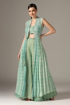 Eco green jacket with all over shibori patterns and shell sequin embroidery. Comes with padded inner bustier and palazzo. - Aza Fashions Drape Skirt Pattern, Asymmetric Cape, Pattern Draping, Shibori Pattern, Women Kurta, Eco Green, Women Blouses Fashion, Palazzo Set, Sequin Embroidery