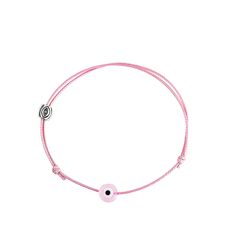 a pink cord bracelet with an evil eye on the end and a silver ball in the middle