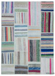 multicolored patchwork rugs are arranged in rows