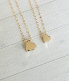 Mix and match these beautiful chunky bronze hearts for a perfect mother daughter(s) gift or purchase a single necklace in your choice of size.♥Large bronze heart measures approximately 3/8"♥Small bronze heart measures approximately 1/3"The necklaces will come hung on 18" long delicate gold filled cable link chains - if you need another size, please let me know.Your new necklace(s) will be beautifully and individually packaged all set to give.This set is also available in gold here:  https://www. Heart Charm Necklace For Best Friend, Gold Heart Pendant Necklace For Best Friend, Heart-shaped Gold Necklace For Best Friend, Heart Beads Necklace For Mother's Day, Everyday Heart Charm Necklaces For Mother's Day, Handmade Necklace For Best Friend Gift On Valentine's Day, Everyday Heart Beads Necklace For Mother's Day, Handmade Necklaces For Best Friend Gift On Valentine's Day, Valentine's Day Best Friend Gift Heart Necklace