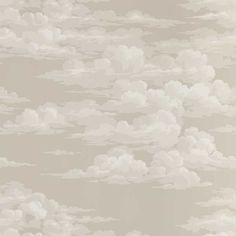 an image of clouds in the sky with white and grey colors on it's sides