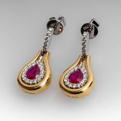 These lovely ruby dangle earrings each feature a pear cut ruby in a four-prong setting. The rubies are each surrounded by a halo, scallop set with fifteen (15) round brilliant cut diamonds. The center is surrounded by a plain, bright polished yellow gold halo. The white gold top of the earring is scallop set with six (6) round brilliant cut diamonds. The earrings measure 21.2mm long by 10.0mm wide, finished with posts and friction nut backs. Signed Spark. The matching necklace is sku AD17754. Elegant Pear-shaped Ruby Jewelry, Formal Pear-shaped Ruby Jewelry, Fine Jewelry Ruby Pear-shaped, Fine Jewelry Pear-shaped Ruby, Fine Jewelry With Pear-shaped Ruby, Ruby Teardrop Earrings Fine Jewelry, Yellow Gold Teardrop Ruby Earrings, Elegant Ruby Earrings With Halo Setting, Ruby Earrings With Halo Setting In Fine Jewelry