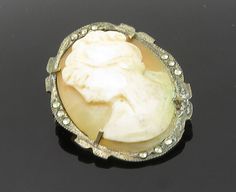 "925 Sterling Silver - Vintage Antique Marcasite Accent Cameo Brooch Pin - BP7913  925 Sterling Silver - Vintage Antique Marcasite Accent Cameo Brooch Pin - BP7913  Jewelry Type:         Brooch Pin   Metal Type:            925 Silver  Metal Size:             1.5\"  Stone Type:            Marcasite   Condition:              N/A  Jewelry Weight:     3.5 Grams  PLEASE NOTE: THIS ITEM IS PRE-OWNED. ALTHOUGH MOST ITEMS ARE IN VERY GOOD CONDITION, SOME MAY NEED CLEANING AND/OR MINOR REPAIRS. WE MAKE A VERY STRONG EFFORT TO UPLOAD CLEAR PICTURES. PLEASE INSPECT ALL PICTURES AND ASK ALL QUESTIONS YOU MAY HAVE PRIOR TO MAKING A PURCHASE. NOT ALL STONES ARE GENUINE, SOME ARE ENHANCED OR CREATED." Vintage Gemstone Brooches, Clear Pictures, Cameo Brooch, Beautiful Rings, Types Of Metal, Brooch Pin, Vintage Antiques, Metallic Silver, 925 Silver