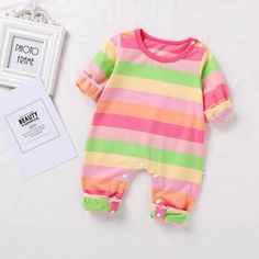 Baby Girls Rainbow Long Sleeve Romper Children Clothing Wholesale Usa - PrettyKid Long Sleeve Pink Onesie With Cartoon Print, Pink Long Sleeve Onesie With Cartoon Print, Long Sleeve Pink Onesie For Playwear, Pink Long Sleeve Onesie For Playwear, Multicolor Cartoon Print Onesie For Playwear, Playful Multicolor Cartoon Print Onesie, Spring Multicolor Cotton Onesie, Multicolor Cotton Long Sleeve Onesie, Cute Multicolor Long Sleeve Onesie