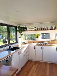 the kitchen is clean and ready for us to use in the day or night time