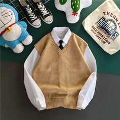 Product Show： White Winter Sweater Vest, Casual Sleeveless School Vest, White V-neck Tank Top For Winter, Classic White Vest For Fall, Classic White Vest For Layering, White Layering Sweater Vest, Classic White Sleeveless Sweater Vest, White V-neck Vest For Fall, White Vest Top For Winter