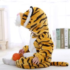 Beautiful baby one-piece animal tiger dress up hooded jumpsuit costume for newborn, infant & toddler boys and girls. Long sleeve hoodie coverall with long fluffy ears and tail to keep arms and legs warm. Banded cuffs to keep sleeve from riding up. Zip closure from neck to ankle. Nickel free metal parts to prevent skin irritation. Made from softest cotton against delicate skin. Clothing is machine wash safe. More sizes are available for this baby clothing set. Baby Tiger Costume, Tiger Onesie, Korean Tiger, Fingerlings Monkey, Monkey Cartoon, Cartoon Stitch, Tiger Costume, Animal Onesie, Fancy Costumes