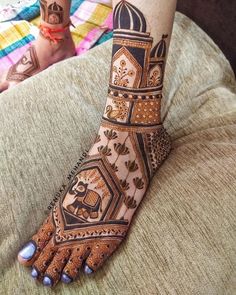 the foot is decorated with intricate designs