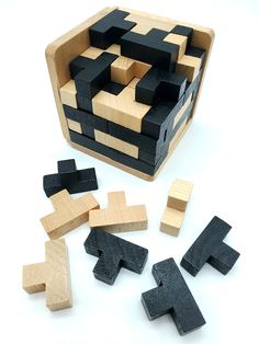 a wooden block set with black and white blocks