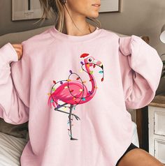 Flamingo Christmas Sweatshirt, Flamingo Christmas Shirt For Women, Flamingo Merry Christmas Sweatshirt, Flamingo Lover, Funny Flamingo Shirt ⭐️ Welcome to FlyaWay Trend Store ⭐️ Our products are BELLA+CANVAS and for Sweatshirts GILDAN quality ✨ FREE SHIPPING is for orders 35 usd and over. Enjoy 30 % OFF SALE! Please contact me for bulk (+10) orders. If you have any problems or questions, please contact me and I will be here to help. NO RETURNS OR EXCHANGES ON SHIRTS/CLOTHING ITEMS. FIT AND SIZIN I Will Be Here, Flamingo Fashion, Funny Flamingo, Flamingo Shirt, Flamingo Christmas, Pop Up Window, Product Pictures, Shirt For Women, Christmas Shirt