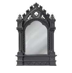 an ornate mirror is shown against a white background