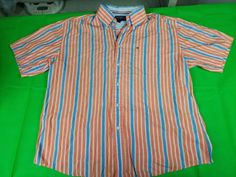 This listing is for one Tommy Hilfiger orange striped men's button up short sleeve shirt size L preowned in good condition. Exactly as Pictured.- Please take some time to review the pictures as they are the best way to determine the condition of the item. if you're interested, don't hesitate to make a serious offer. Tommy Hilfiger Short Sleeve Shirt For Spring, Tommy Hilfiger Spring Short Sleeve Shirt, Mens Button Up, Short Sleeve Shirt, Sleeve Shirt, Casual Button Down Shirt, Tommy Hilfiger, Button Up, Men Casual