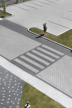 an aerial view of a paved parking lot