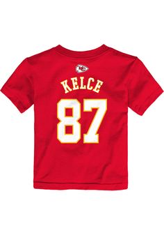 Travis Kelce Kansas City Chiefs Infant Mainliner NN Short Sleeve T-Shirt Red Game Day Jersey T-shirt With Letter Print, Jersey T-shirt With Letter Print For Game Day, University Red T-shirt With Team Name For Fans, Jersey T-shirt With Team Name For Fan Merchandise, Sports Event Jersey T-shirt With Team Logo, Red T-shirt For Football Season, Collegiate T-shirt With Name Print For Fans, Sports Tops With Name Print In Jersey, Sports Jersey Tops With Name Print