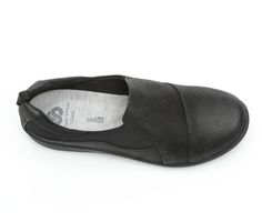 Women's Clarks Lightweight Comfort Slip-Ons. Find tranquility and comfort in the Clarks Sillian Paz! Cloud Steppers soft cushion insoles, lightweight soles, and soft fabrics combine to give a high-quality experience. Simple and comfy style is here to stay with the Clarks Sillian Paz! 1 1/4 inch built in heel,Padded heel collar,Synthetic and performance fabric uppers,Stitching accents,Rear pull loop,Shock absorbing midsole,Textile lining,Simple slip-on design,Lightweight EVA traction outsole,Inso Comfortable Slip-ons With Arch Support And Flat Heel, Black Slip-ons With Arch Support, Comfortable Synthetic Walking Shoes With Cushioned Footbed, Comfortable Synthetic Walking Shoes With Arch Support, Comfortable Slip-on Walking Shoes With Removable Insole, Comfortable Slip-ons With Arch Support And Closed Toe, Ergonomic Slip-resistant Walking Shoes, Comfortable Closed Toe Slip-ons With Ortholite Insole, Comfortable Slip-on Walking Shoes With Ortholite Insole