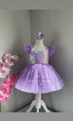 Hello☺️Our dresses are handmade products.Personalized design is available🌸you can let me know by sending a message.Our dresses use cotton lining and have a hidden zipper at the back.Dense layers of tulle are used on the skirts of our dresses and they are fluffy dresses,A hair accessory is also sent as a gift along with the dress🎁We deliver your order within 4 business days with fast shipping💖Thank you for choosing us and we wish you pleasant shopping.⭐️⭐️⭐️⭐️⭐️ Princess Style Fitted Fairy Dress For Pageant, Fitted Whimsical Fairy Dress For Party, Whimsical Fitted Fairy Dress For Party, Whimsical Purple Princess Dress For Wedding, Whimsical Purple Wedding Dress, Fitted Fairytale Dress For Pageant, Fairytale Fitted Dress For Pageant, Fairytale-style Fitted Dress For Pageant, Fairytale Fitted Pageant Dress