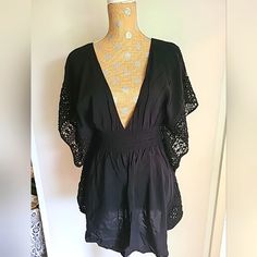 This Victoria's Secret Beach Swim Coverup In Size M Is Perfect For Your Next Beach Day. The Black Color And Crochet Butterfly Sleeves Add A Touch Of Style To This Lightweight, Backless Coverup. Made Of 100% Viscose, This Coverup Is Easy To Care For With Hand Wash Only. The Beach Theme Makes It A Must-Have For Any Summer Wardrobe. Pet & Smoke Free Home Chic V-neck Mini Dress With Crochet Trim, Elegant Victoria's Secret Mini Dress For Summer, Fitted Lace Dresses By Victoria's Secret, Victoria's Secret Beach Dress, Elegant Beach Mini Dress With Crochet Trim, Black Lace Mini Dress For Beach, Victoria's Secret Fitted V-neck Dress, Fitted V-neck Dress By Victoria's Secret, Black V-neck Mini Dress For Beachwear