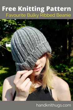 a woman wearing a knitted hat with text overlay that reads free knitting pattern favorite bulky ribbed beanie