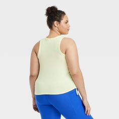 Why we're ALL IN: Pullover tank top with a ribbed solid-color finish and reinforced stitching around the neckline and armholes. Made of midweight fabric with spandex for flexible wear that moves with you. Moisture-wicking and quick-drying properties help keep you feeling cool and fresh. Tailored in a semi-fit, long-length silhouette. Functional ties down each side complete the design with adjustable cinching. All in Motion™: Made for every move, priced for every day. Ribbed Sleeveless Gym Activewear, Sleeveless Ribbed Workout Activewear, Ribbed Sleeveless Sportswear Activewear, Ribbed Sports Tops With Tank Straps, Sporty Solid Color Tank Top For Spring, Sleeveless Tops For Light Exercise In Spring, Spring Sleeveless Athletic Fit Tops, Fitted Functional Tank Top For Spring, Spring Athletic Fit Sleeveless Tank Top