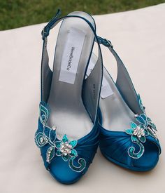 For the Bride or anyone who loves unique specially handmade shoes! Teal Shoes slingback style, medium heel: 2.5'' with a 1/2'' platform that makes them extra comfortable. I presently have enough trim for a few more pairs, please contact. Colors: Teal, also known as Peacock color, please look at the third picture, it shows the color much closer; if, you are matching your color to something i suggest to *buy a color swatch to view the actual color. *TO SEE THE ACTUAL COLOR FOR THESE SHOES, OR ANY Embellished Slingback Heels For Wedding, Teal Wedding Shoes, Teal Flats, Reception Shoes, Wedding Shoes Boots, Teal Heels, Teal Shoes, Flowers Beads, Green Sandals