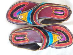 Bohemian shoes, colourful women's sandals from Punjab: Fashion footwear for the contemporary city dweller, from five centuries back. Mumtaz, the lady for whom the Taj Mahal was built probably lived in shoes and sandals much like these. Originally meant for the Maharajahs and the Maharanis [Kings and Queens and such royalty], these handcrafted fashion footwear for men and women mainly come from the villages of Punjab and Rajasthan. This period fashion piece was introduced to India during the Mugh Traditional Closed Toe Toe Ring Sandals For The Beach, Traditional Brown Toe Post Flip Flops, Bohemian Multicolor Huarache Sandals For Festivals, Traditional Handmade Closed Toe Huarache Sandals, Traditional Multicolor Huarache Sandals For Spring, Traditional Closed Toe Huarache Sandals For Festivals, Traditional Sandals With Single Toe Strap For Festive Occasions, Traditional Fair Trade Huarache Sandals For Festivals, Traditional Round Toe Sandals For Beach