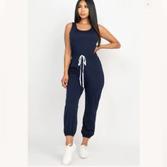 Soft Stretch Light Weight Double Knot Jersey Elasticized Waist With Ribbon Bow Model Is 5’8” Wearing A Size S Sleeveless Cotton Jumpsuits And Rompers For Athleisure, Sleeveless Cotton Jumpsuits And Rompers In Athleisure Style, Casual Blue Cotton Bodysuit, Sporty Blue Jumpsuits And Rompers For Spring, Navy Sleeveless Fitted Jumpsuits And Rompers, Blue Sleeveless Cotton Bodysuit, Casual Sleeveless Bodysuit, Casual Blue Sleeveless Bodysuit, Blue Athleisure Jumpsuits And Rompers For Summer