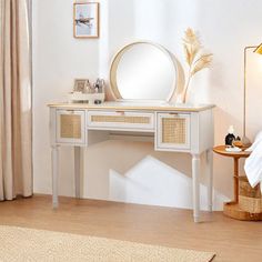 a white desk with a mirror on top of it next to a lamp and window