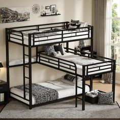 a bunk bed with two sets of beds underneath it in a room next to a window