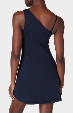 High-stretch fabric offers easy movement in this sporty dress with an asymmetric neckline, a removable strap and built-in shorts with drop-in side pockets. 31" length; 4" inseam; 18" leg opening (size Medium) One-shoulder neck Removable, adjustable strap Shelf bra Built-in shorts underneath with drop-in pockets Moisture-wicking fabric engineered for dryness and comfort 79% polyester, 21% elastane Machine wash, dry flat Imported Asymmetrical Stretch Elastane Mini Dress, Fitted Sleeveless Asymmetrical Elastane Dress, Summer Stretch One Shoulder Asymmetrical Dress, Summer Asymmetrical One Shoulder Stretch Dress, Asymmetrical Neckline Stretch Mini Dress, One-shoulder Elastane Summer Dress, One-shoulder Summer Dress, Sleeveless Elastane One-shoulder Dress For Night Out, Summer Stretch Asymmetrical Dress With Asymmetrical Neckline