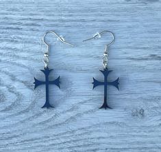 Enhance your Halloween look with our stylish Cross Halloween Earrings for Women. These unique earrings make the perfect gift for any Halloween lover, and will add a touch of spooky elegance to any outfit. Made with high quality materials, these earrings are both durable and fashionable. Made with stainless still surgical hooks and 1/8 cast acrylic Item Dimension:Length 1 in (25.25mm)Width 0.6 in (16.81mm)Thickness 0.11 in (3mm) Black Cross Jewelry For Halloween, Nickel-free Black Plug Earrings As Gift, Spooky Black Nickel-free Jewelry, Gothic Plug Earrings For Halloween Gift, Gothic Halloween Plug Earrings As A Gift, Black Punk Plug Earrings As Gift, Black Punk Plug Earrings For Gift, Nickel-free Gothic Black Plug Earrings, Handmade Black Gothic Earrings