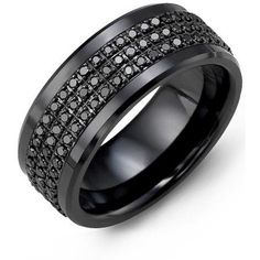 a black ring with white diamonds on it