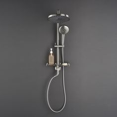 a shower head with thermostaer and hand held showerhead in stainless steel