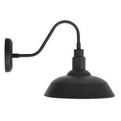 an industrial style wall light with a black metal shade on the side and a white background