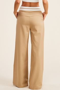 Maika Trouser Contrast waistband trouser pant. Color: Beige Zip closure Mid rise Full length with wide leg fit Model is wearing a size Small Summer Workwear Full Length Chinos, Cotton Wide Leg Pants With Pull-on Style, Beige Wide Leg Dress Pants, Versatile Wide-leg Spring Dress Pants, Versatile Wide Leg Spring Dress Pants, Cotton Wide Leg Bottoms For Business Casual, Spring Wide Leg Versatile Dress Pants, Spring Wide Leg Dress Pants, Chic Wide Leg Cotton Dress Pants