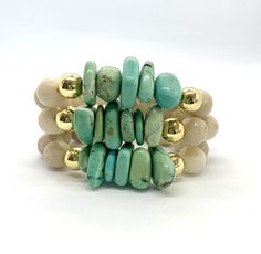 "This listing is for 1 bracelet made with ivory faceted stones and turquoise chip beads. My hand-beaded bracelets are made with stretch elastic which makes it comfortable and easy to wear. My bracelets are made to fit an average wrist size of 6.5\"-7\". Take a look around my shop for additional colors to add to your stack! The more the better!" Bohemian Turquoise Stretch Bracelet With Faceted Beads, Bohemian Beige Round Beads Stretch Bracelet, Bohemian Beige Stretch Bracelet With Round Beads, Turquoise Stretch Bracelet With Round Beads, Spiritual Amazonite Stretch Bracelet, Turquoise Stretch Bracelet With Stackable Round Beads, Turquoise Stackable Stretch Bracelet With Round Beads, Adjustable Turquoise Stretch Bracelet With Natural Stones, Adjustable Spiritual Amazonite Stretch Bracelet