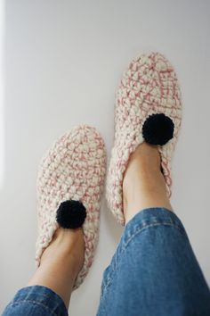 Ready to ship, these hand-crocheted wonders make for the perfect holiday gift.  Warm and snug, these cozy booties are guaranteed to give your feet the warm and fuzzies this Christmas. Give the gift of warmth and style to your loved ones, offering them a touch of handmade luxury that transcends the ordinary. Whether it's a treat for yourself or a thoughtful present for someone special, our women's bootie slippers are bound to bring joy and comfort to anyone lucky enough to slip their feet into them. Embrace the charm of handmade craftsmanship and the unparalleled comfort of 100% bulky wool with our women's bootie slipper. It's not just footwear; it's a wearable work of art ready to accompany you on your coziest adventures. - Crafted with care, those bootie slippers are labor of love, with o Hand Knitted Round Toe Slippers For Winter, Hand-knitted Round Toe Winter Slippers, Hand Knitted Round Toe Winter Slippers, Cozy Hand-knitted Slippers With Round Toe, Cozy Hand-knitted Round Toe Slippers, Cozy Hand Knitted Slippers With Round Toe, Cozy Knitted Booties With Round Toe, Handmade Cozy Yarn Slippers, Cozy Crochet Slippers For Winter