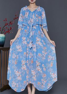 Women Blue Ruffled Print Chiffon Dresses Cloak SleevesFabric: ChiffonSize & Fit: Fit: This garment fits true to size.Length: Size M measures 47.58"from shoulder to hemBust: Great for any cup size. Waist: Loose Fit. Comfortable room throughout midsection.Hip: Loose Fit - room for hips. Hand Wash Cold.