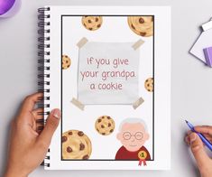 a hand holding a notebook with an image of grandma and cookies on the cover that says, if you give your grandpa a cookie