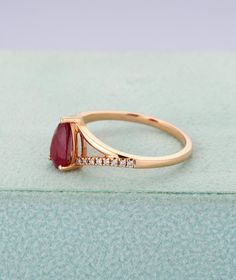 Ruby engagement ring in rose goldPear shaped wedding | Etsy Formal Pear-shaped Sapphire Ring With Vvs Clarity, Formal Vvs Clarity Pear-shaped Sapphire Ring, Diamond Teardrop Ring For Proposal, Teardrop Brilliant Cut Proposal Ring, Formal Pear-shaped Emerald Ring With Diamond, Proposal Ring With Pear-shaped Brilliant Cut, Classic Solitaire Teardrop Ring, Classic Teardrop Solitaire Ring, Elegant Pear-shaped Yellow Gold Birthstone Ring