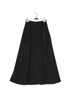 Maxi length skirt made from nylon. Oversized style with flared skirt and drawstring around the hemline. Matching Padded Shoulder Pullover Anorak Jumper. Model is in MINUSEY ONE SIZE. ✔️ Free worldwide express shipping over $100✔️ Loved by 6,500+ customers✔️ Limited edition collections, maximum style⠀⠀⠀⠀⠀⠀⠀⠀⠀Stay ahead of the trend with can’t-find-anywhere-else staples. Your closet will thank you 💕 * MINUSEY ONE SIZE = EU 34-38, US 2-6* 100% Nylon* Dry clean* Made in Korea - Model Height: 168cm/5'6" (US2, EU34) Nylon Full Skirt For Spring, Spring Full Nylon Skirt, Black Nylon Lined Skirt, Spring Nylon Long Skirt, Black Nylon Skirt, A-line Bottoms With Elastic Waistband In Black, Spring Long Nylon Skirt, A-line Black Bottoms With Elastic Waistband, Black Voluminous Skirt With Elastic Waistband