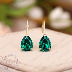 "❤Jewelry Details -Gold Type : Solid 14K Gold / Solid 18K Gold (Choose One in Material Option) -Center Stone: Lab Created Emerald 6*8mm, Approximately 1.35ct*2pcs Color: Green--- 5A Clarity: VVS Cut: Pear Cut / 3EX Earring Width: 6mm Earring Length: 14.5mm SKU: YE0080 ~*-*~Purchase Guarantee: - All our jewelry is handmade, and each process is refined. - 14 Day Refund Guarantee. - All our products are Free Shipping. - Free Gift Box&Packing. ~*-*~Please contact us if you need service: 1. Ring Resizing. 2. Metal Change(PT950/10k/14k/18k White/Yellow/Rose Gold). 3. Engraving ring (less than 10 letter). 4. Accept customization. We believe that our quality, attention to detail, design and customer service make us stand out from the competition. If you have any questions, please let me know and I 14k Gold Drop Bridal Earrings As Gift, 14k Gold Bridal Drop Earrings For Gift, Fine Jewelry Bridal Earrings In 14k Gold, Fine Jewelry 14k Gold Bridal Earrings As Gift, 14k Gold Bridal Earrings - Fine Jewelry Gift, 14k Gold Fine Jewelry Bridal Earrings As A Gift, 14k Gold Drop Earrings For Wedding, Yellow Gold Pear-shaped May Birthstone Earrings, Wedding Emerald Earrings Fine Jewelry