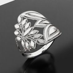 Elegant Silver Flower Ring For Wedding, Luxury White Gold Jewelry With Intricate Design, Elegant White Flower Ring For Wedding, Elegant Flower Ring With Diamond Accents As Gift, Elegant Flower Ring With Diamond Accents For Gift, Elegant White Gold Filigree Jewelry, Timeless Diamond Jewelry With Decorative Band, Refined Wedding Jewelry With Polished Finish, Refined Polished Jewelry For Wedding