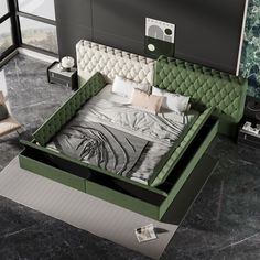 a bed with green headboard and pillows in a room that looks like it has been made