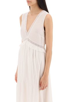 Sleeveless dress from the 'See by Chloé' collection crafted in pure cotton voile. Design with double V-neckline and empire waistline decorated with lace inserts at bodice and hem. Lined interior. Regular fit with straight silhouette and ankle length. The model is 177 cm tall and wears size FR 36. Size Info FR Color Detail White Made In China Material 100% CO Season One spring Season Two summer Product clothing Brand See By Chloe Size And Fit Chic V-neck Maxi Dress With Lace Trim, Sleeveless Lace Maxi Dress With Contrast Lace, White Feminine Dress With Contrast Lace, White Sleeveless Maxi Dress With Delicate Lace, Sleeveless Midi Dress With Contrast Lace, Chic Sleeveless Midi Dress With Contrast Lace, Feminine Maxi Length Dress With Delicate Lace, Chic Summer Dress With Lace Bodice, Feminine Delicate Lace Maxi Dress