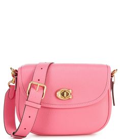 From COACH, the Willow Pebble Leather Saddle Shoulder Bag features:Polished pebble leatherTurn-lock closureFabric liningInside zip and multifunction pocketsOutside open pocketDetachable strap for shoulder or crossbody wearInterchangeable webbing strapApprox. 8.75" L x 7" H x 3" W bag; 21.5" detachable strap drop; 23.5" webbing strap dropImported. Pink Leather Shoulder Bag With Cc Turnlock Closure, Pink Leather Bag With Cc Turnlock Closure, Coach Pebbled Leather Satchel With Gold-tone Hardware, Classic Coach Bags With Cc Turnlock Closure, Coach Leather Shoulder Bag With Cc Turnlock Closure, Leather Crossbody Satchel With Cc Turnlock Closure, Coach Leather Bag With Cc Turnlock Closure, Coach Leather Saddle Bag With Adjustable Strap, Leather Coach Bag With Cc Turnlock Closure