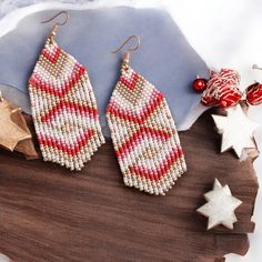 This red and white beaded fringe earrings are made of seed beads, silver plated ear hooks, nylon thread, silicon plugs. All the color fit perfectly and give a mesmerizing look that fits every outfit! Fringe earrings size: The full length of earrings with hook is 3.5 inches approximately. Please contact me if you want these earrings in another size. - Please follow my Esty Page - Follow me on Instagram for updates on new designs and collections @mannat_designco - Follow me on Facebook @MannatDesignCo Cute Chandelier, Winter Christmas Party, Christmas Party Earrings, Red White Christmas, Beaded Fringe Earrings, Unique Women, Christmas Bead, Party Earrings, Earrings Cute